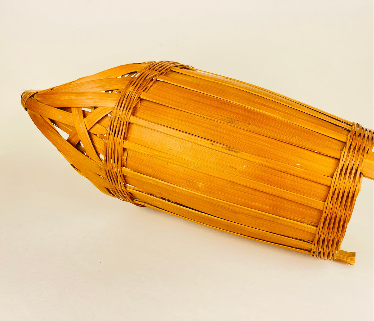 Product image for 'vintage 1970s tall wicker wine basket with pedestal base handle' (view 472566)