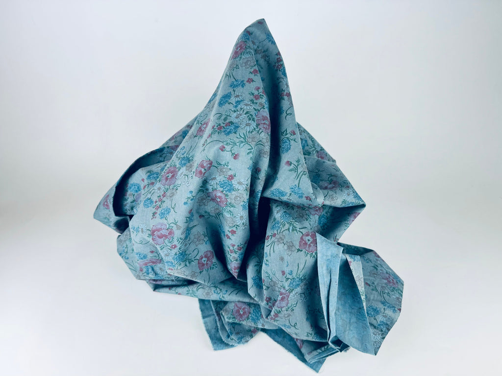 Blue floral fabric on a white background