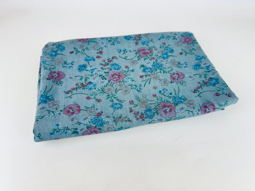 Floral-patterned fabric on a white background