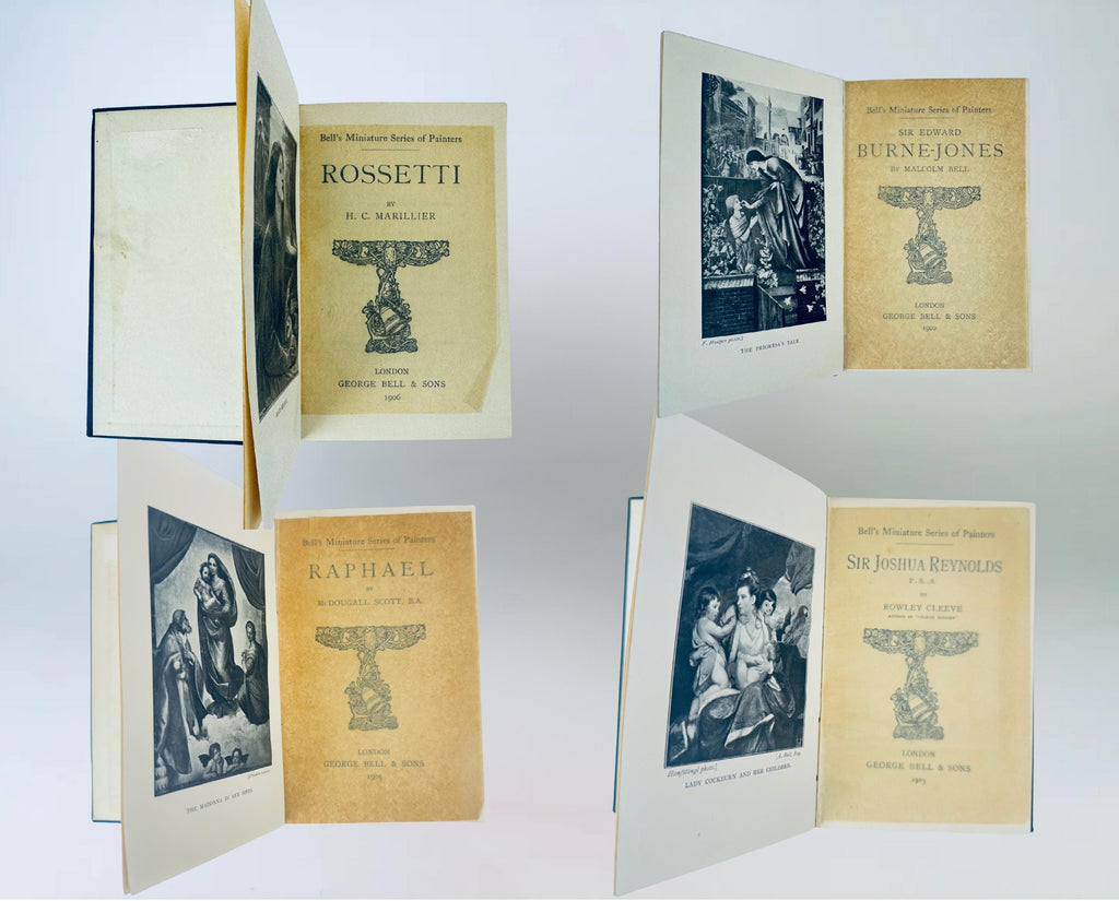 Set of vintage books with decorative covers on a white background