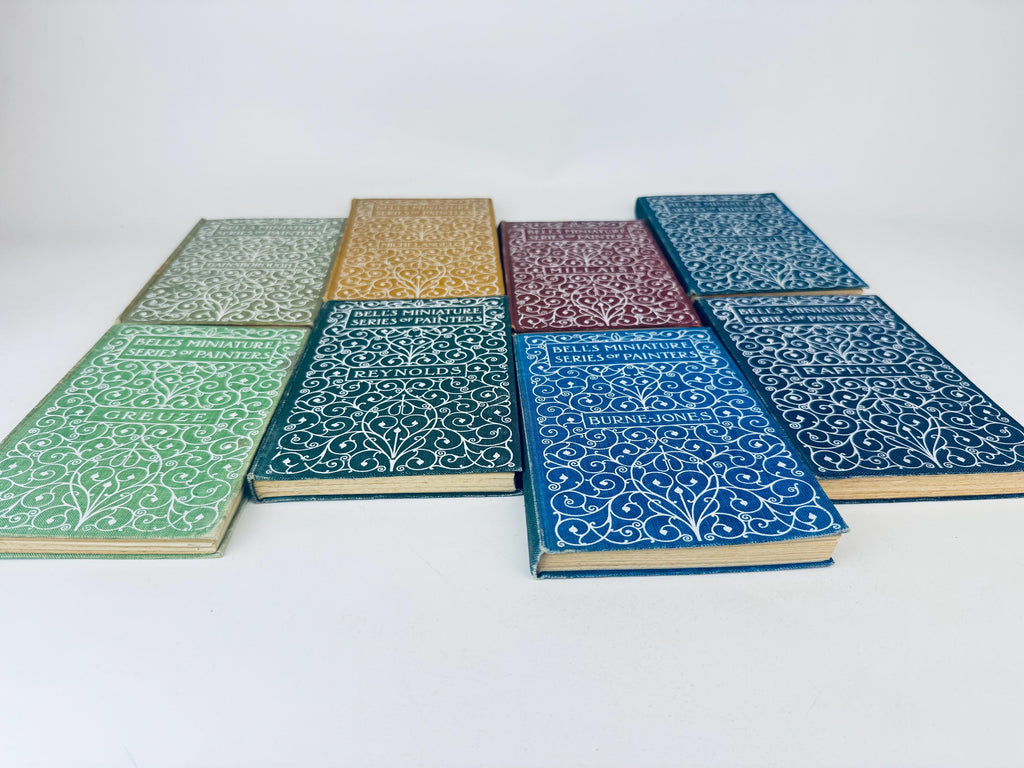 Set of notebooks with decorative covers on a white background