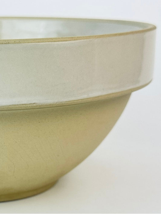Vintage No. 30 French stoneware mixing bowl by Grespots Digoin, shown against a white backdrop with soft natural light highlighting its matte exterior and glazed interior rim.