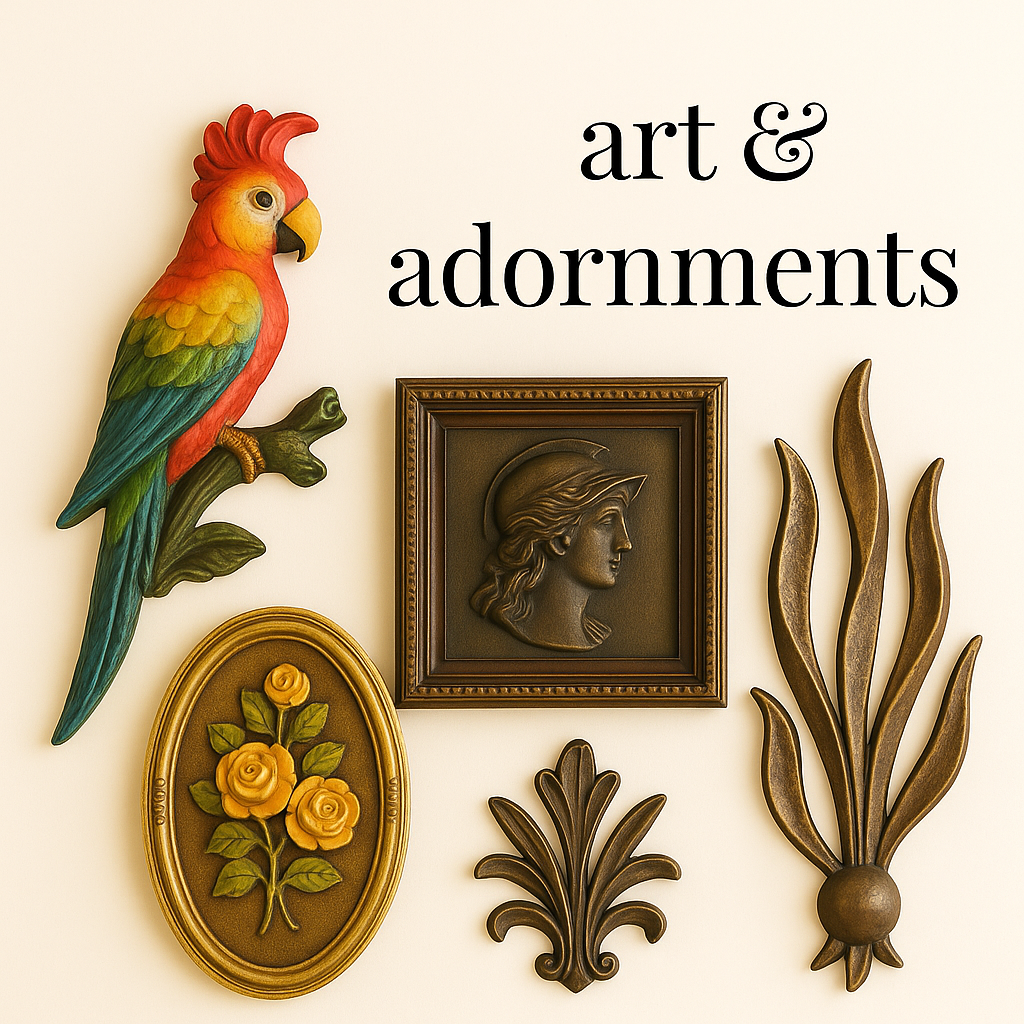 Vintage wall art display featuring a colourful parrot, classical profile plaque, floral oval frame, and ornate gold-toned sculptural accents, under the text ‘art & adornments’.