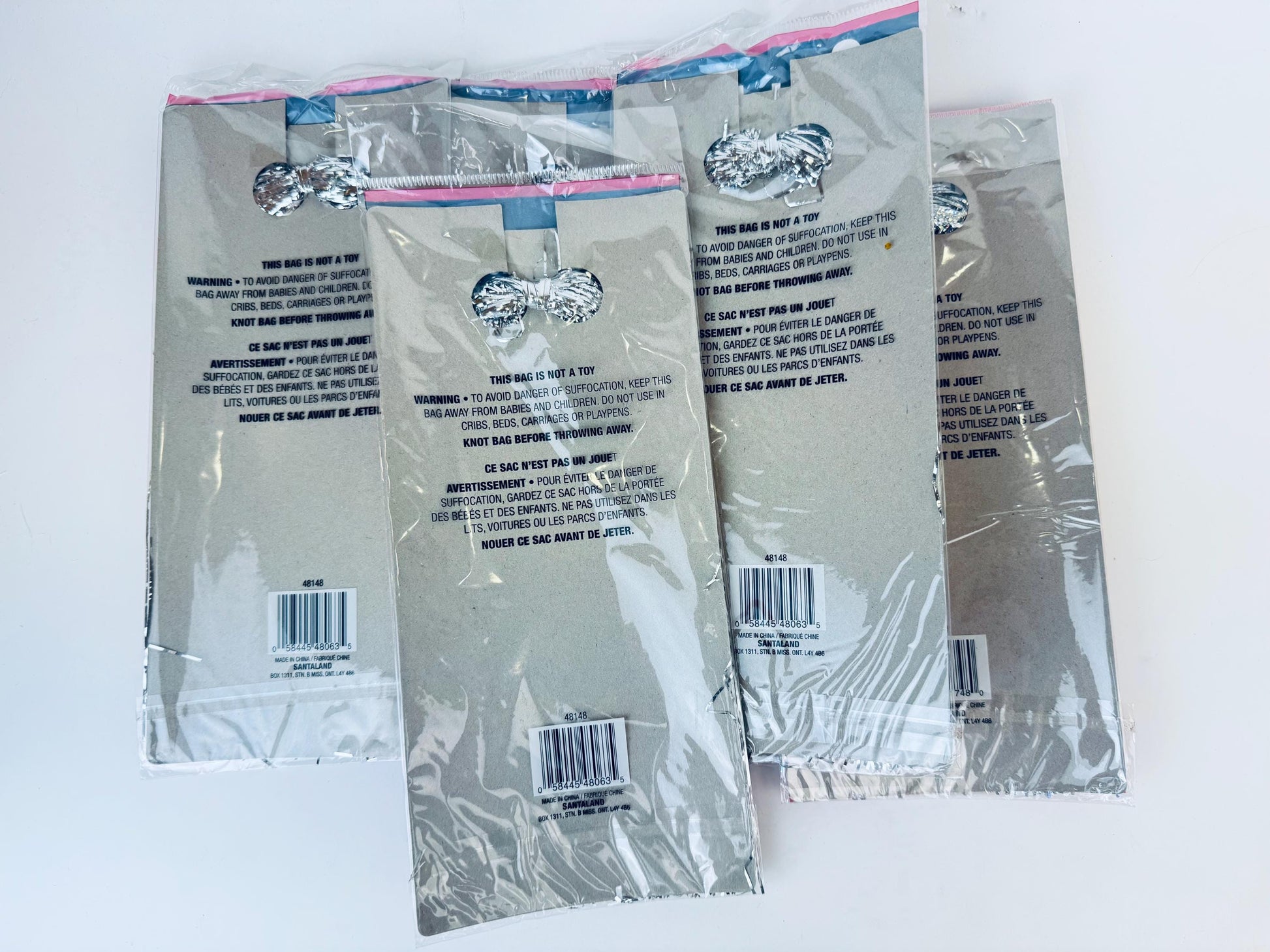 Product image for 'vintage flameproof silver christmas tree icicles tinsel strands new old stock nos packages sold separately' (view d53a24)