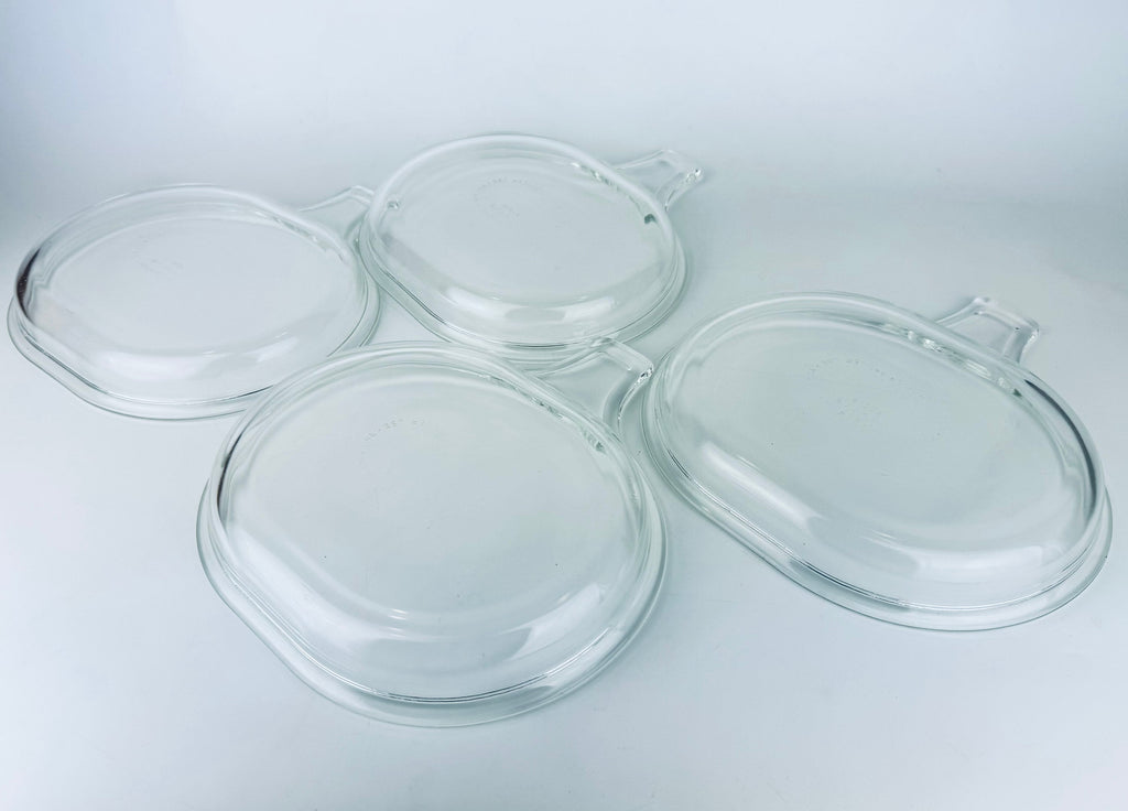Product image for 'vintage pyrex clear glass grab it microwave oven plates set of two 2 600 b 15 cm x 20 cm made in usa sets sold separately' (view 3c95e2)