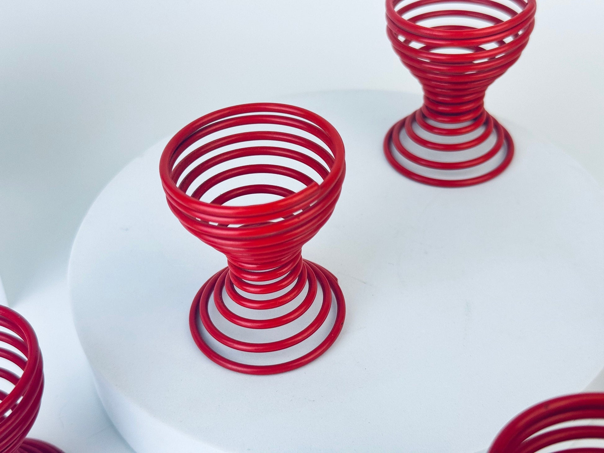 Product image for 'vintage 1980s metal spring egg skelter cup holders sets sold separately' (view ed736b)