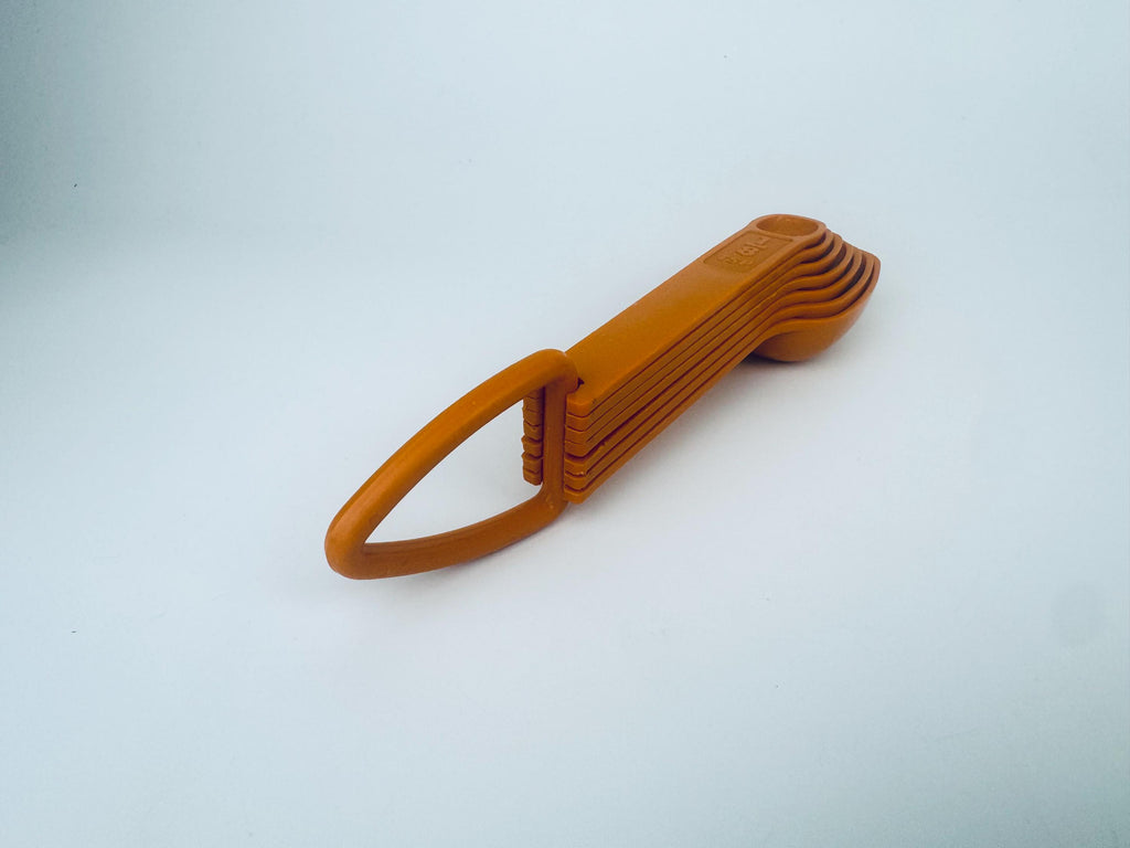 Product image for 'vintage 1980s tupperware orange plastic stacking measuring spoons classic retro kitchenware' (view f1091f)