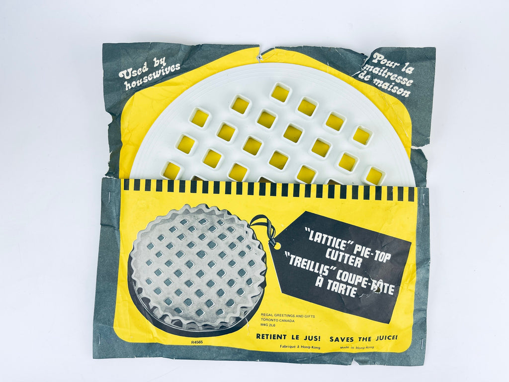 Product image for 'vintage plastic lattice pie top cutter saves the juice made in hong kong' (view 75f1fd)