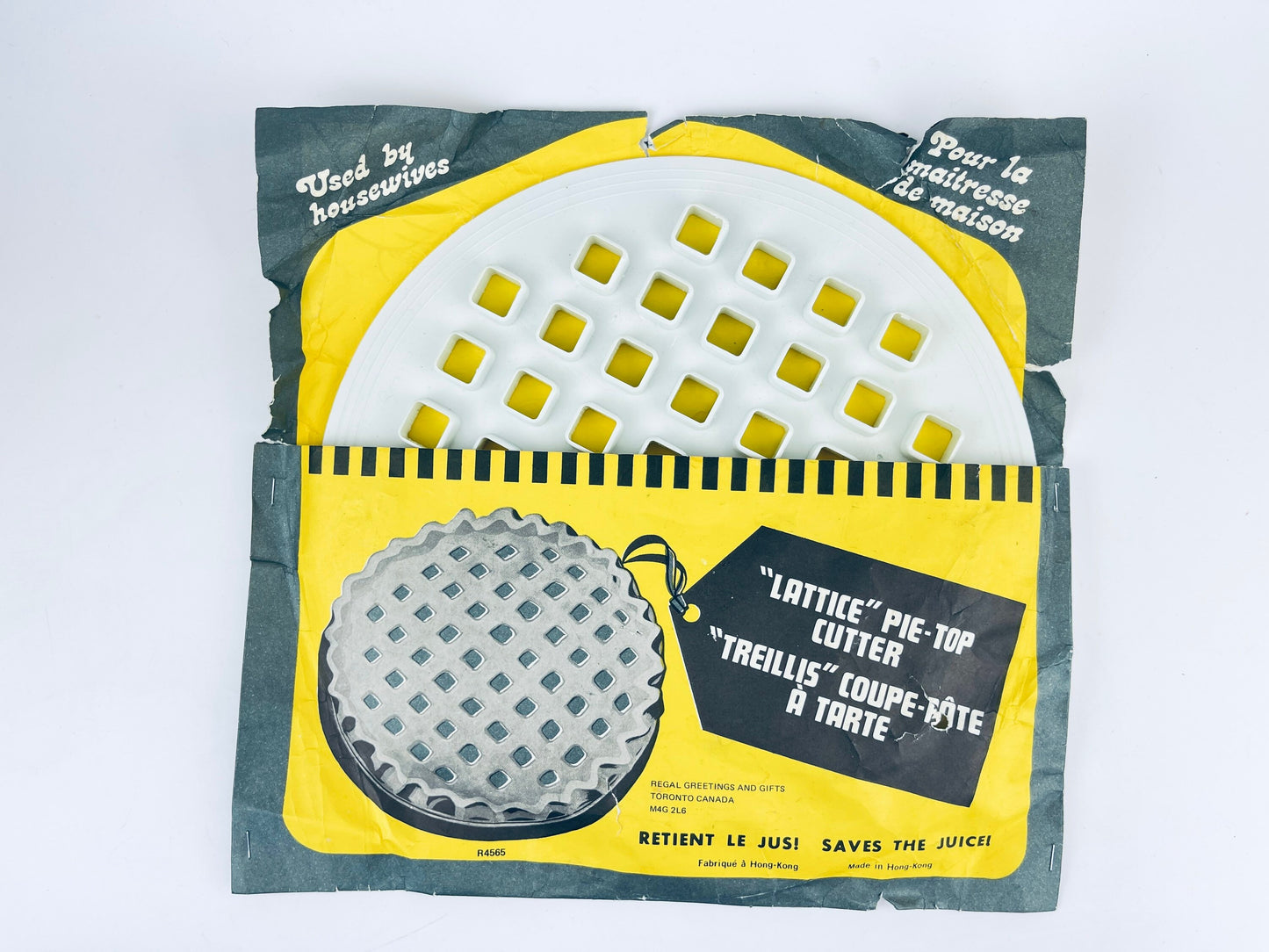 Product image for 'vintage plastic lattice pie top cutter saves the juice made in hong kong' (view 75f1fd)