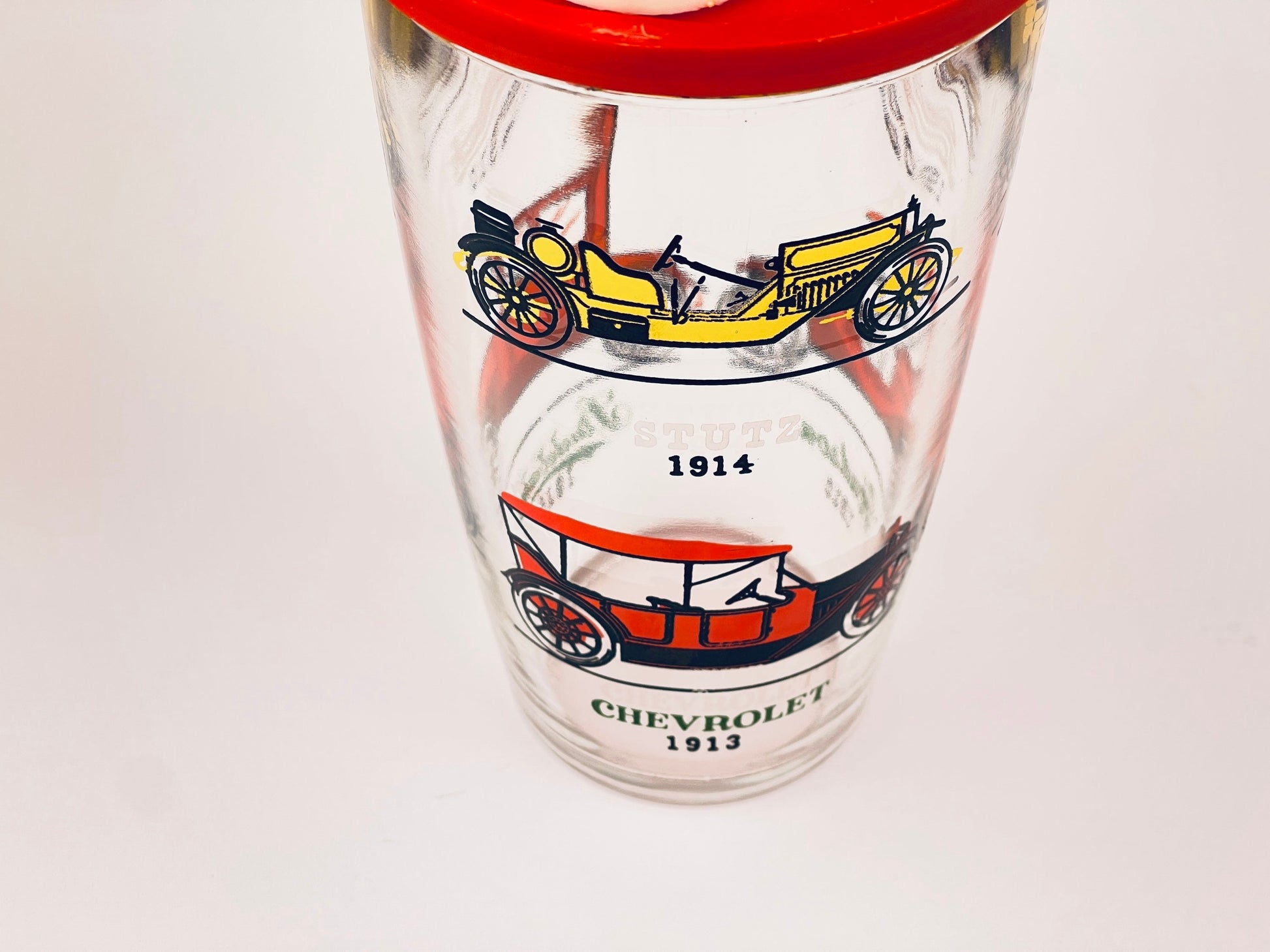 Product image for 'vintage 1970s hazel atlas cocktail shaker with antique car design red plastic lid' (view 757eeb)