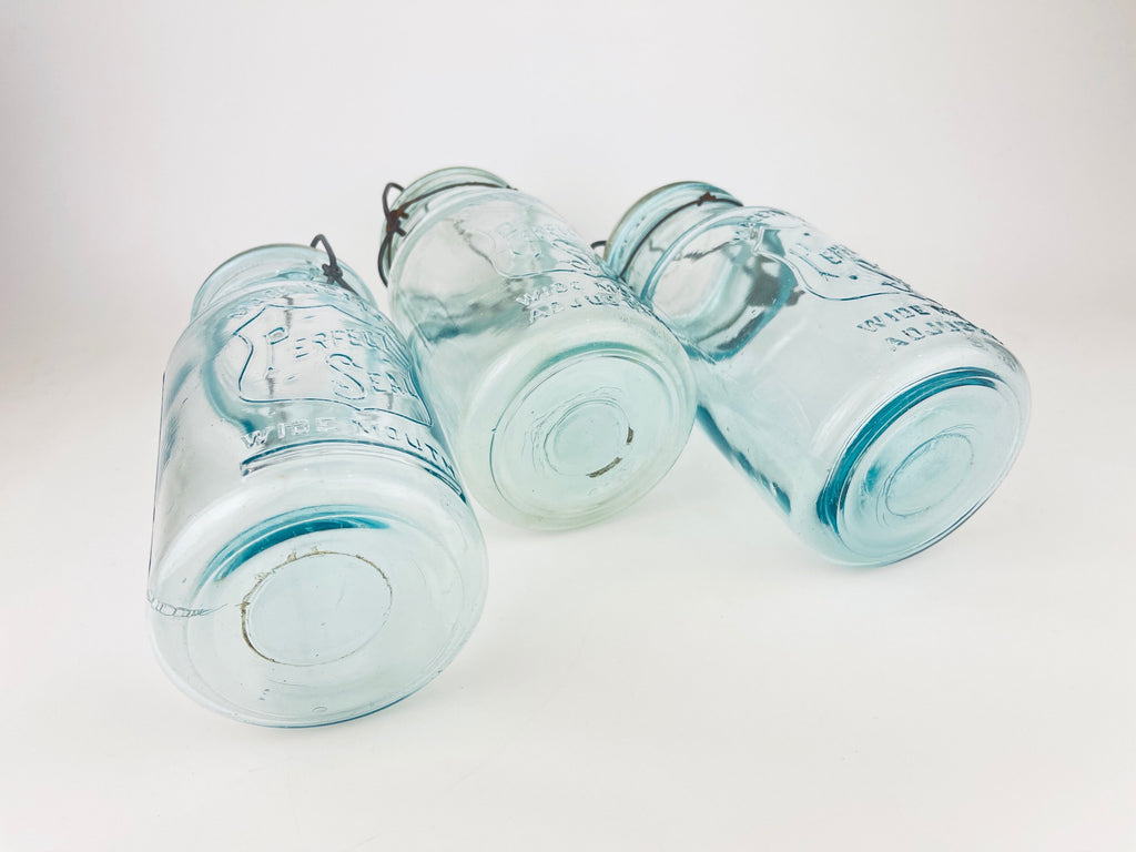 Product image for 'antique safety seal wide mouth aqua blue glass jar 2 pint capacity lightning metal hinge clasp made in canada sold separately 1' (view 17ec1a)