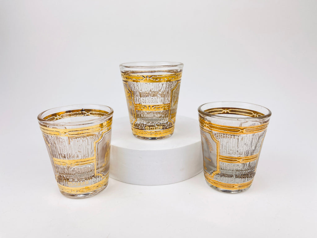 Product image for 'vintage culver tyrol heavy glass 22 kt gold souvenir shot glasses hawaii universal studios california sold individually' (view 144e08)