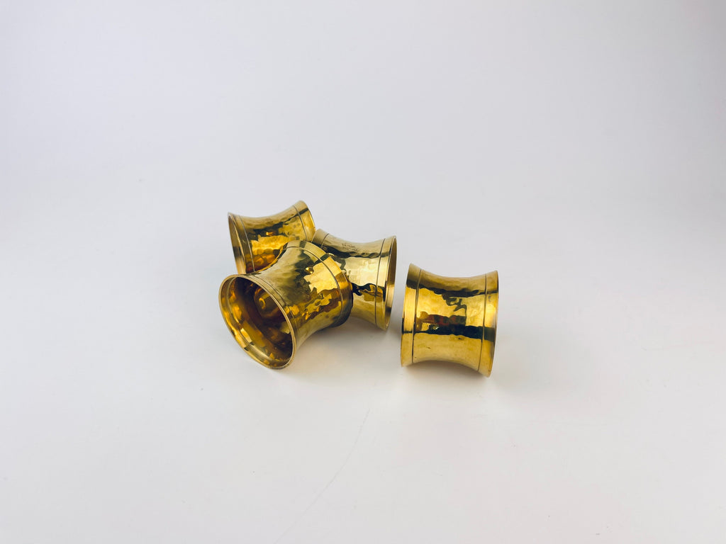 Product image for 'vintage hammered brass hourglass shaped napkin ring holders set of four 4 attractive aged metal patina' (view e193ab)