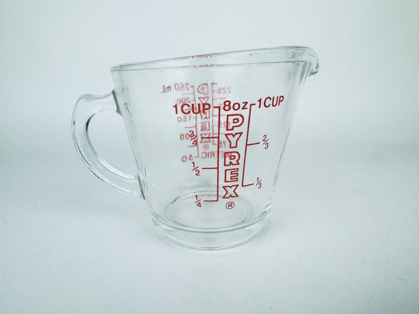 Product image for 'vintage red pyrex glass measuring cups metric imperial system made in usa sold separately' (view fef4ff)