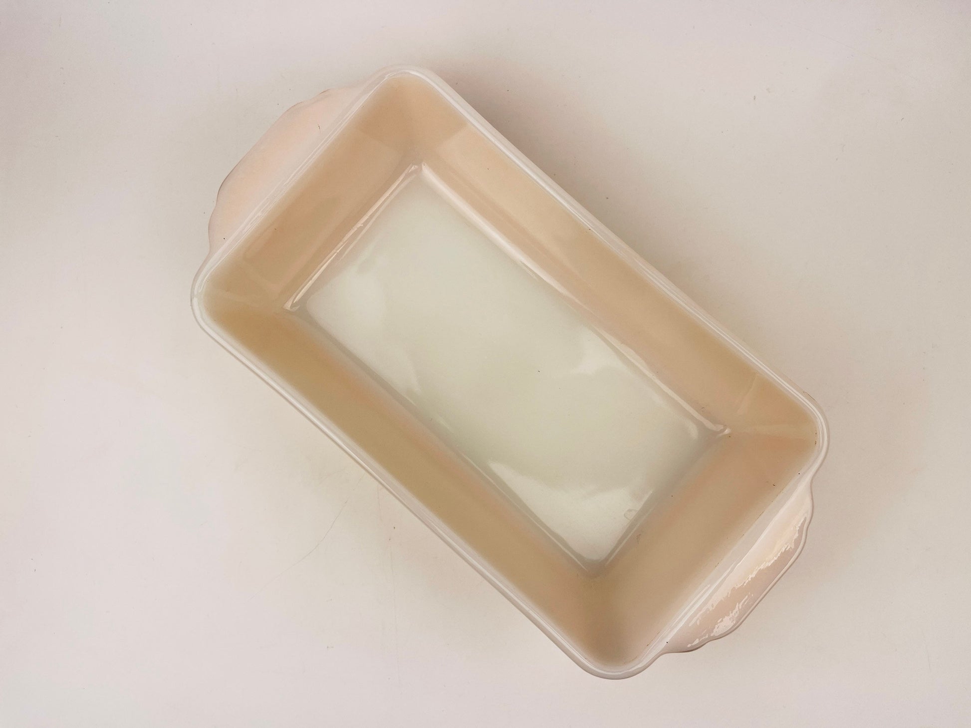 Product image for 'vintage fire king peach lustreware loaf dish 409 1 qt capacity made in usa' (view e81536)