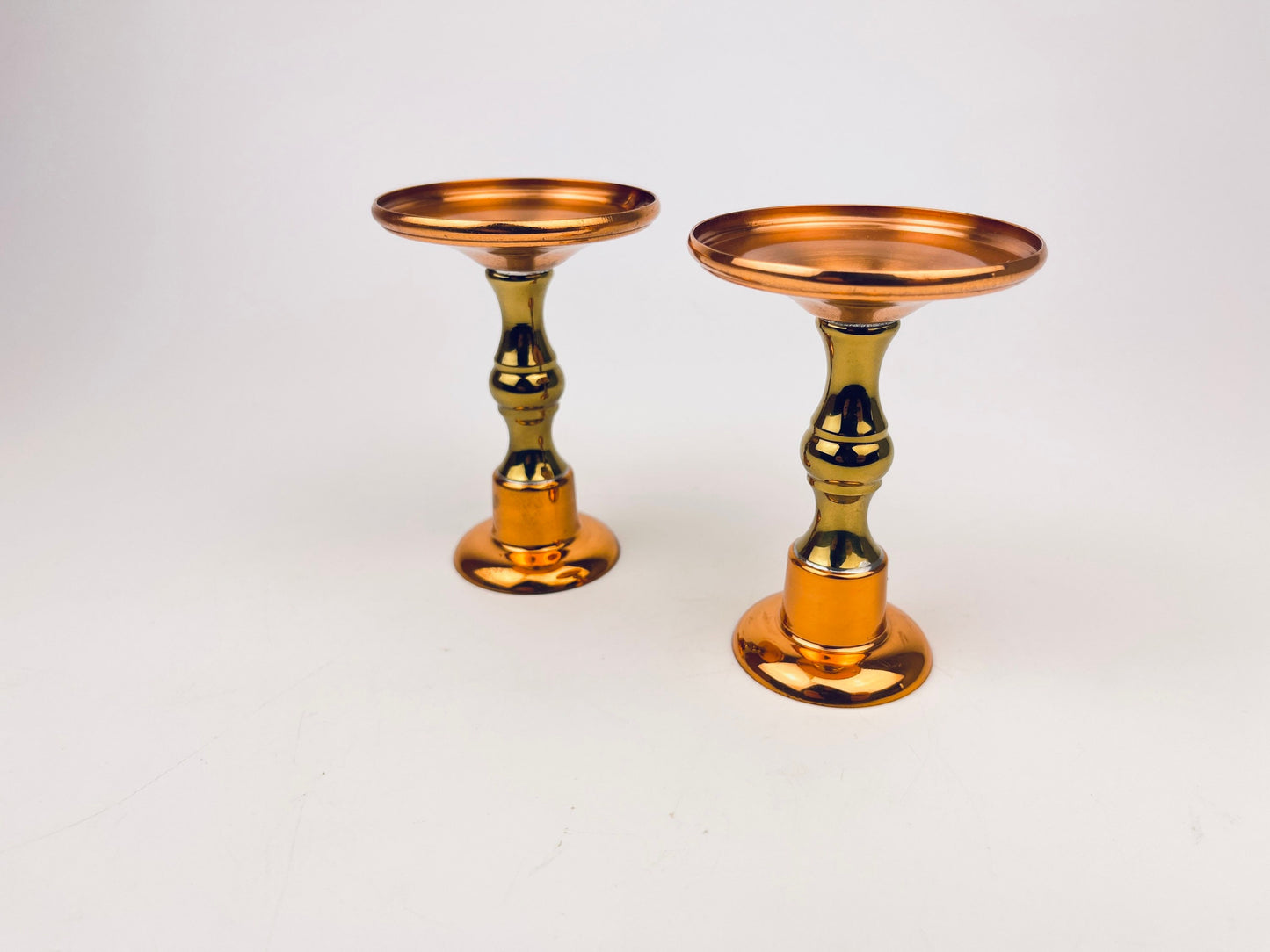 Product image for 'vintage copper brass candlestick holders attractive aged metal patina set of two 2 coppercraft guild' (view 0be2e9)