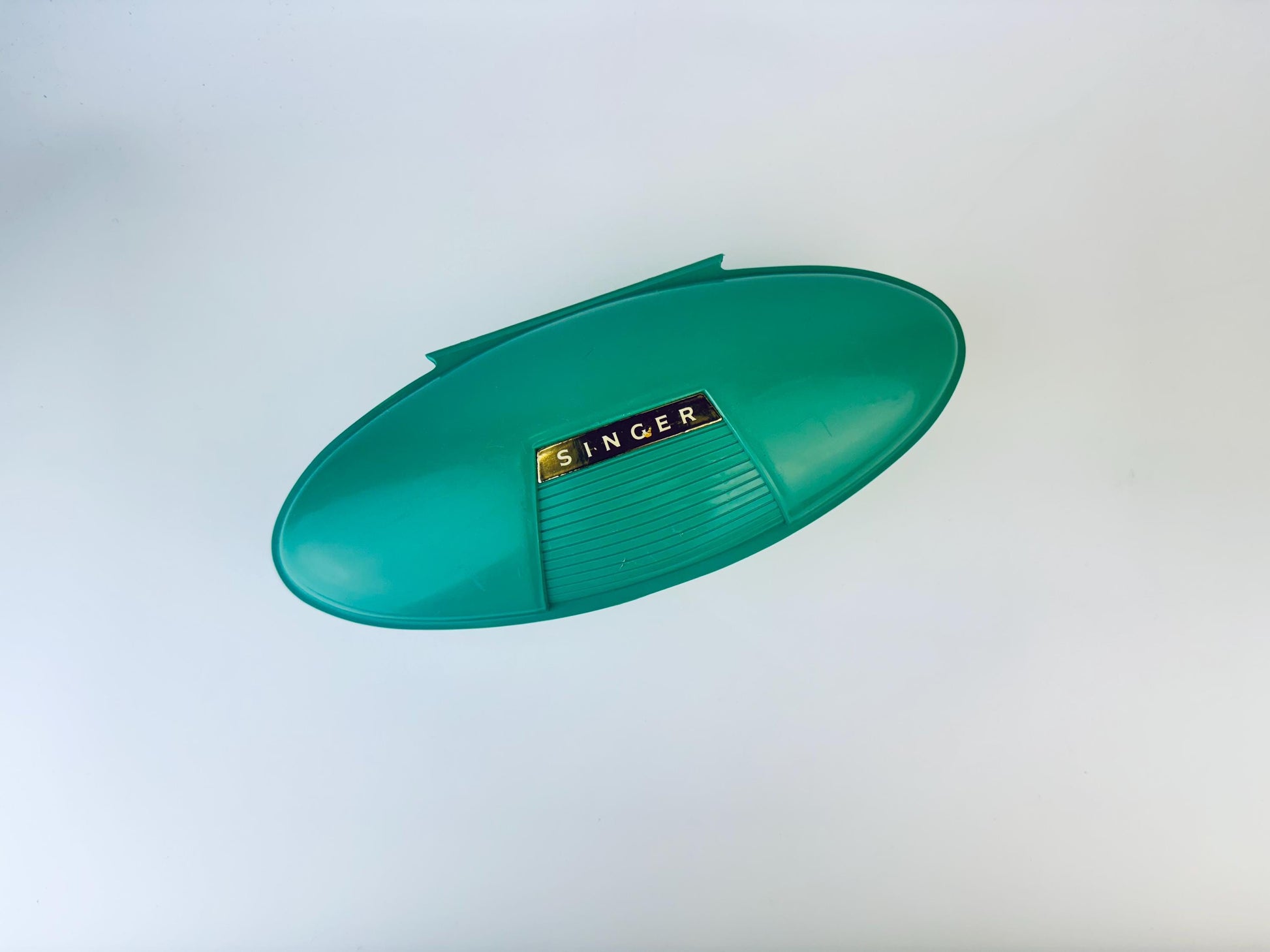 Product image for 'vintage singer slant shank buttonhole attachment 489510 patent 2482607 made in usa atomic jetsons aqua green case' (view 242687)