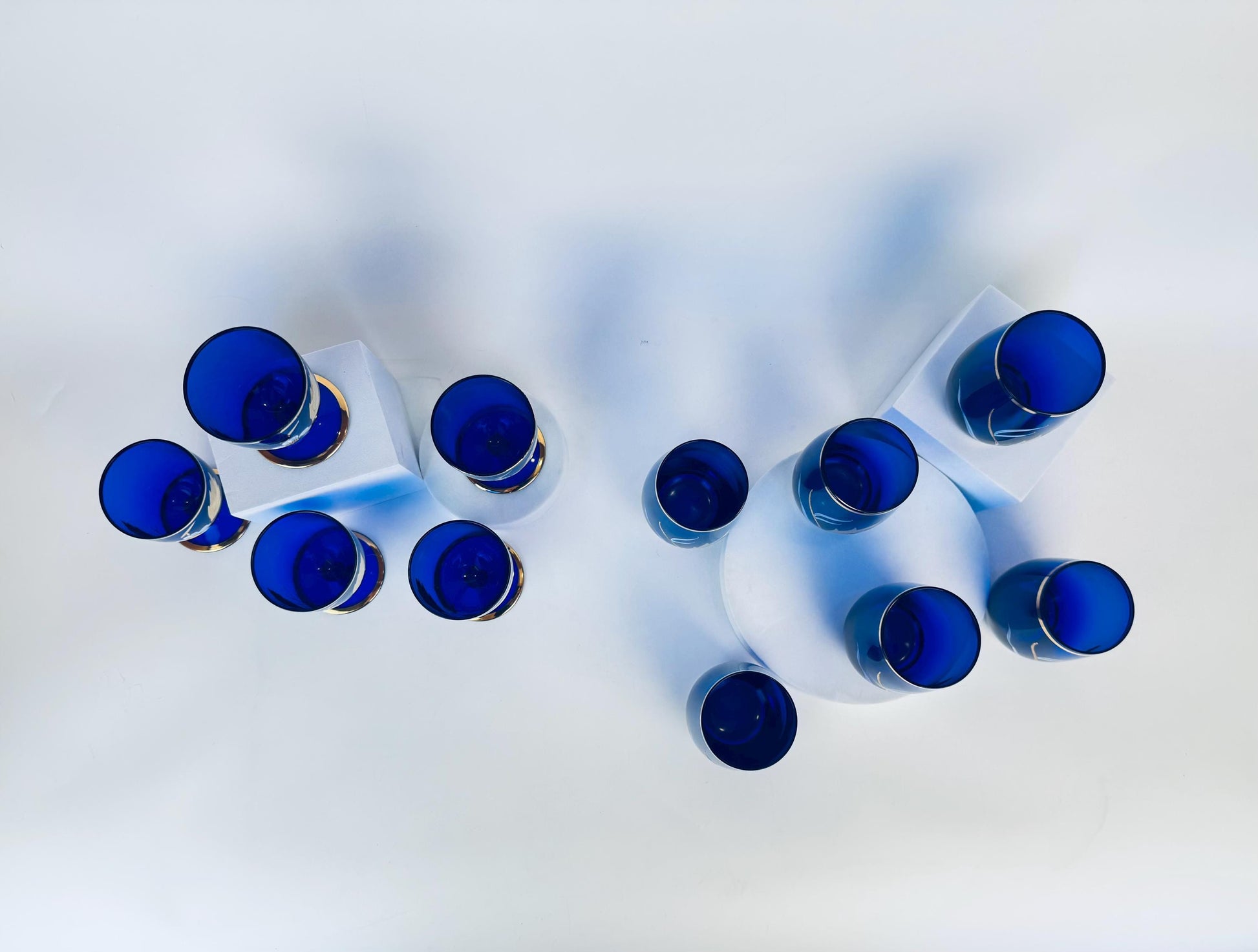 Product image for 'vintage cobalt blue glassware hand painted flowers gold rim small goblet and tumbler set' (view 07469a)
