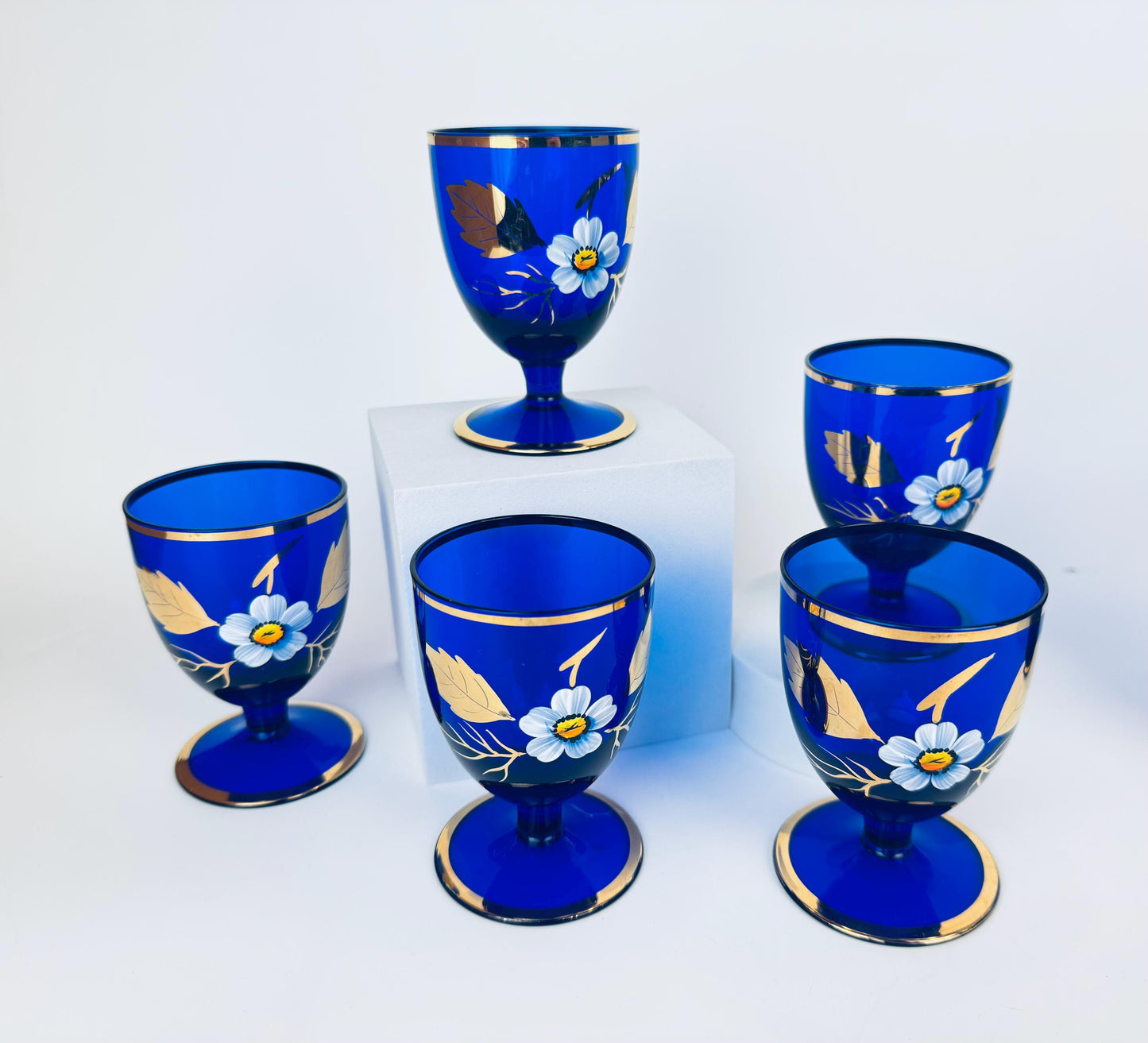 Product image for 'vintage cobalt blue glassware hand painted flowers gold rim small goblet and tumbler set' (view 2926eb)