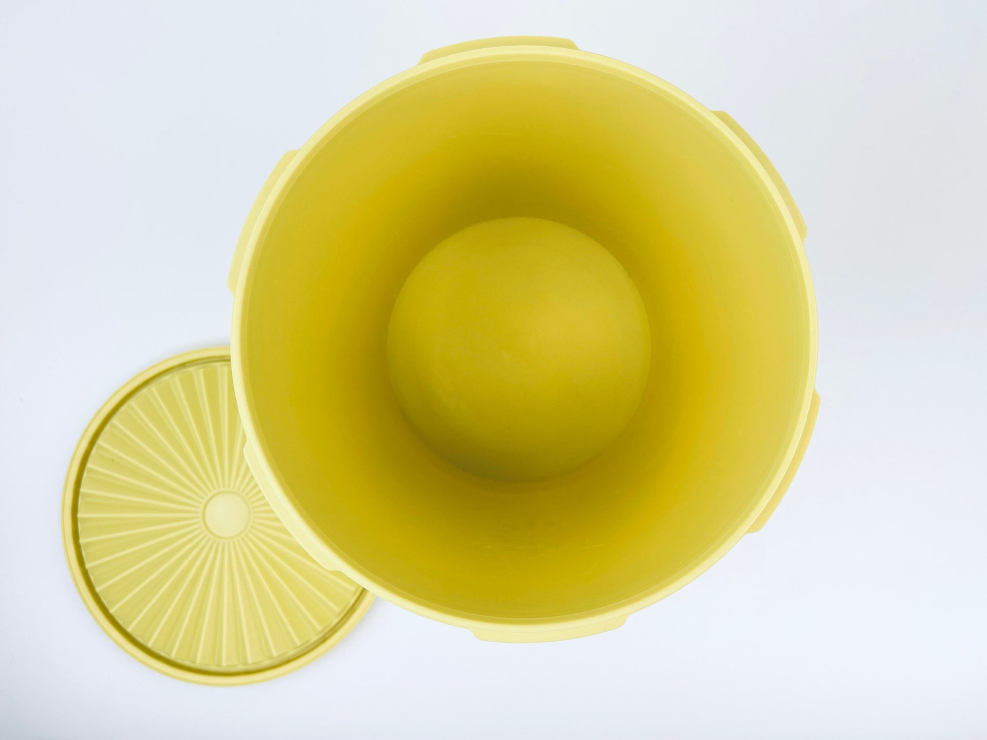 Product image for 'vintage yellow plastic tupperware countertop containers servalier lid starburst pattern made in canada sets sold separately' (view 64f671)