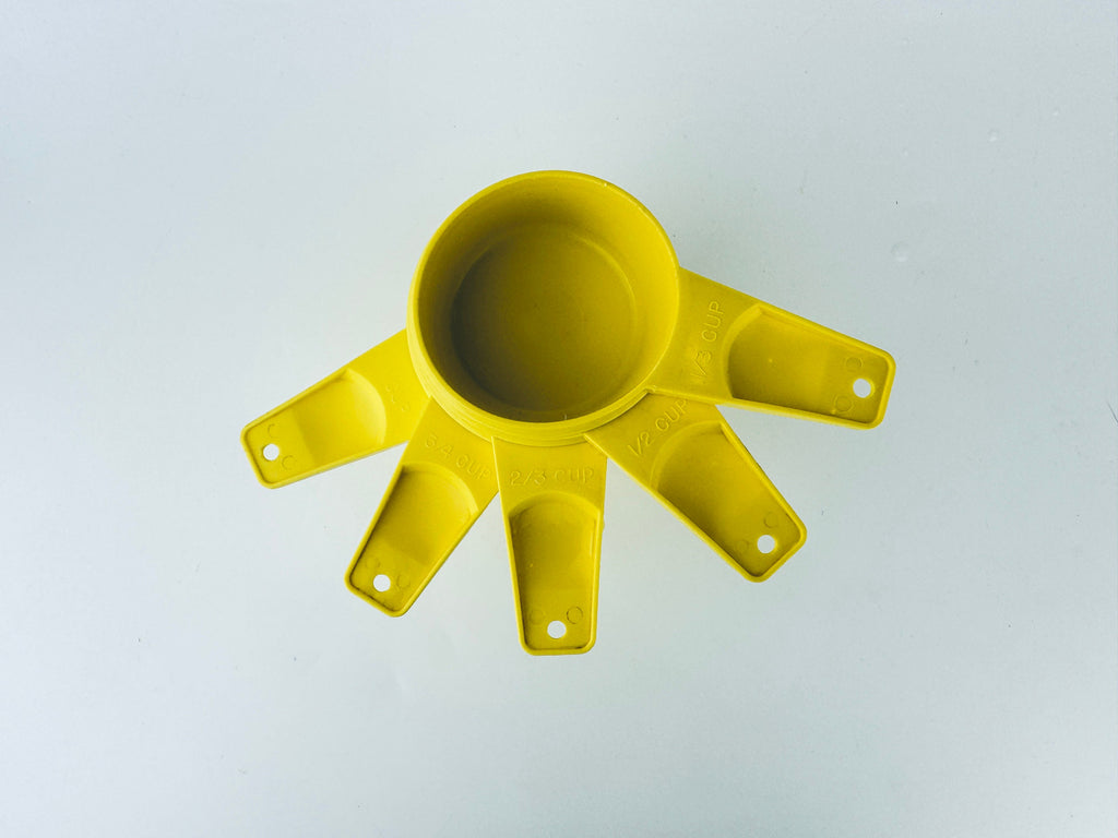 Product image for 'vintage stacking plastic tupperware measuring cups set of five 5 made in canada sets sold separately' (view d8782e)