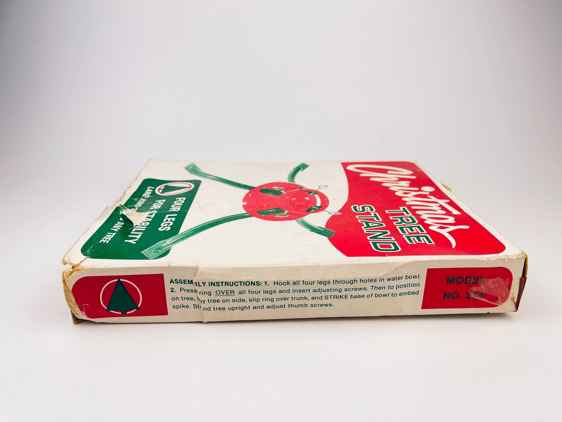 Product image for 'vintage metal christmas tree stand four legs for stability large ring stands any tree simpson sears' (view 213e06)