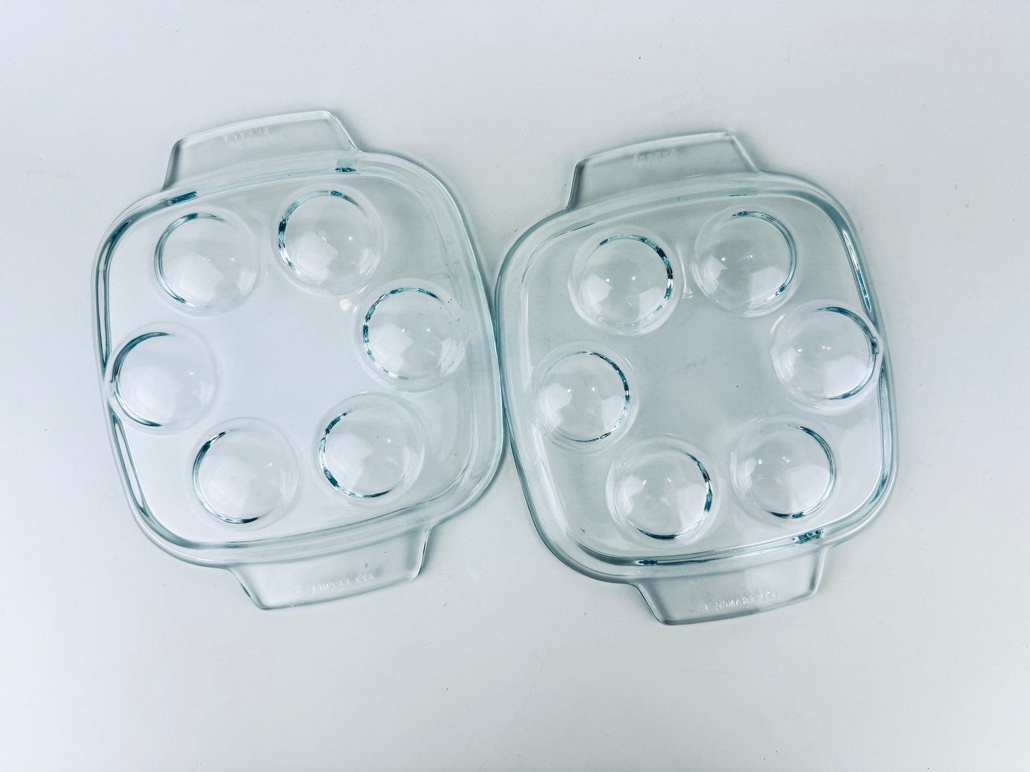 Product image for 'vintage pyrex clear glass escargot snail devilled egg plates 473 set of two 2 made in france' (view a7125f)