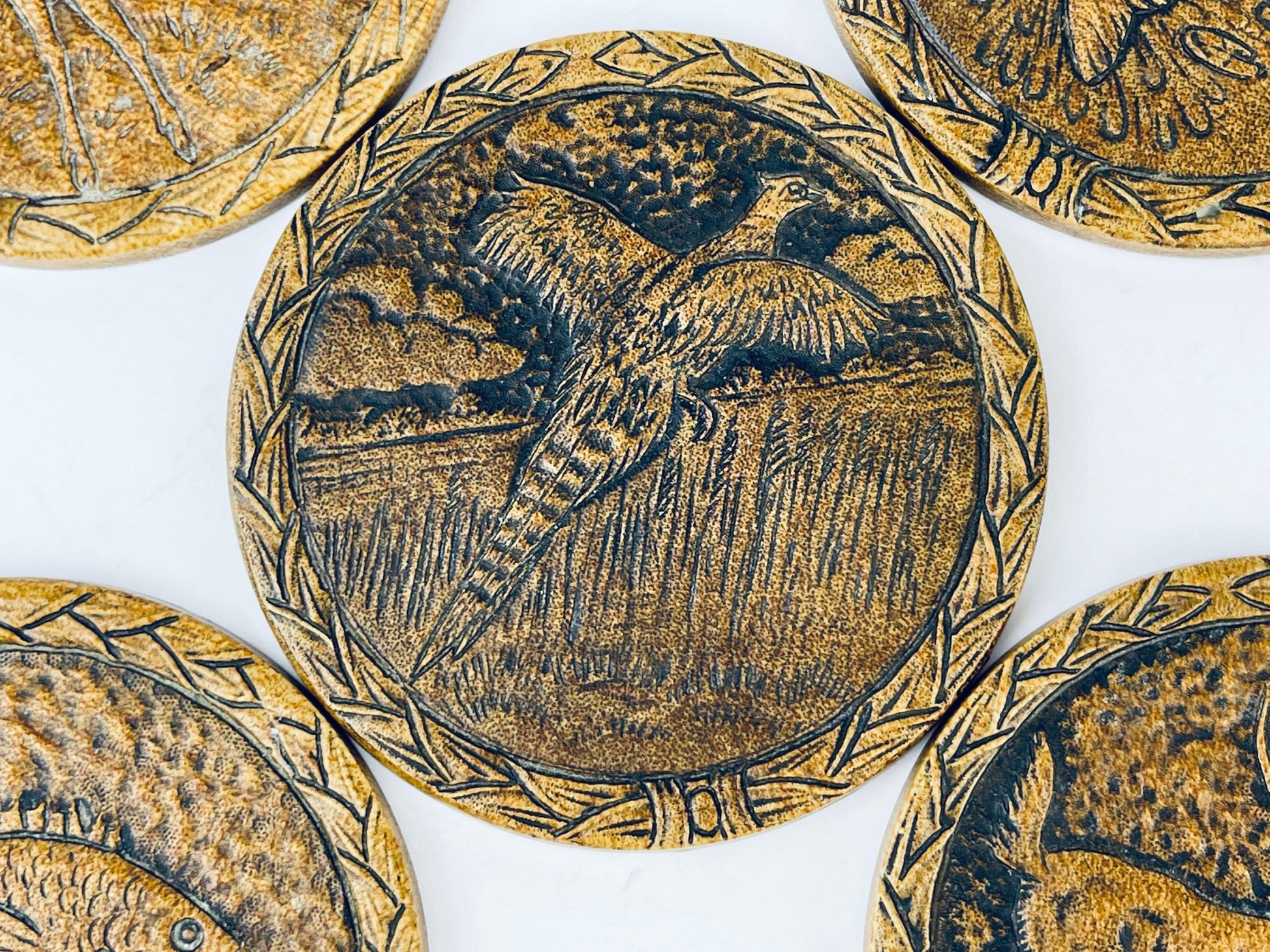 Product image for 'vintage faux wood outdoorsman coaster set set of five 5 pheasant deer fish' (view af5fdf)