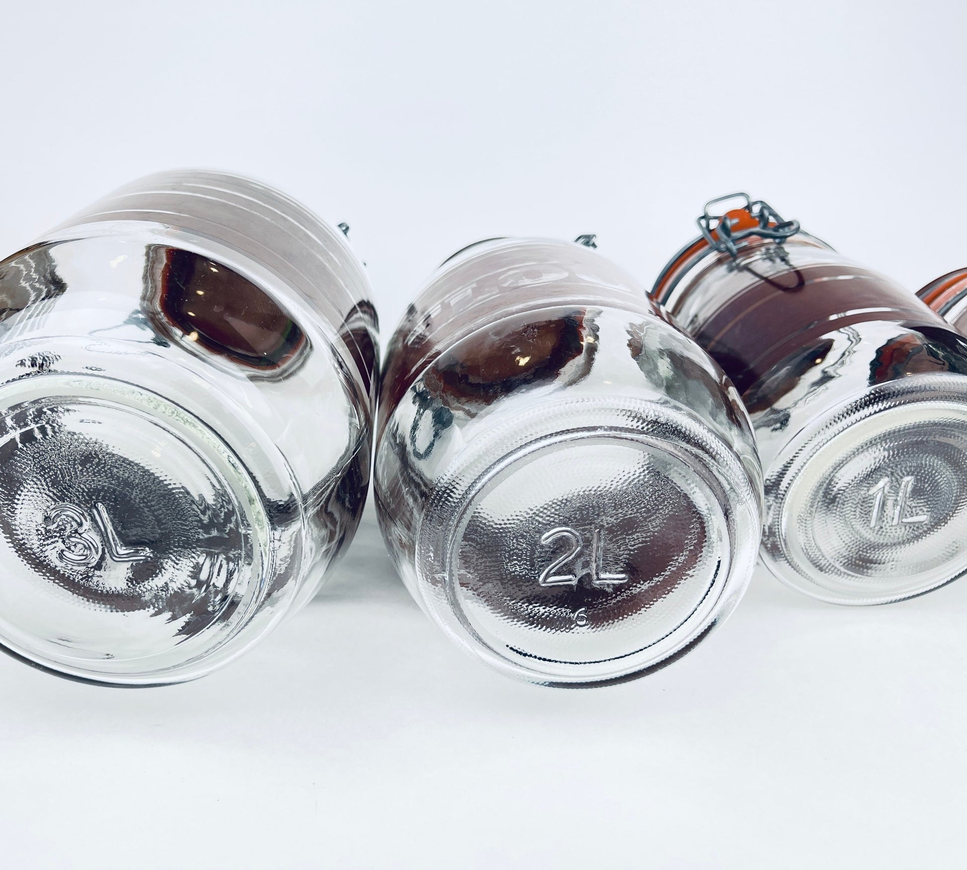 Product image for 'vintage brown striped glass canister set 1980s kitchen storage with orange seals' (view b594d6)