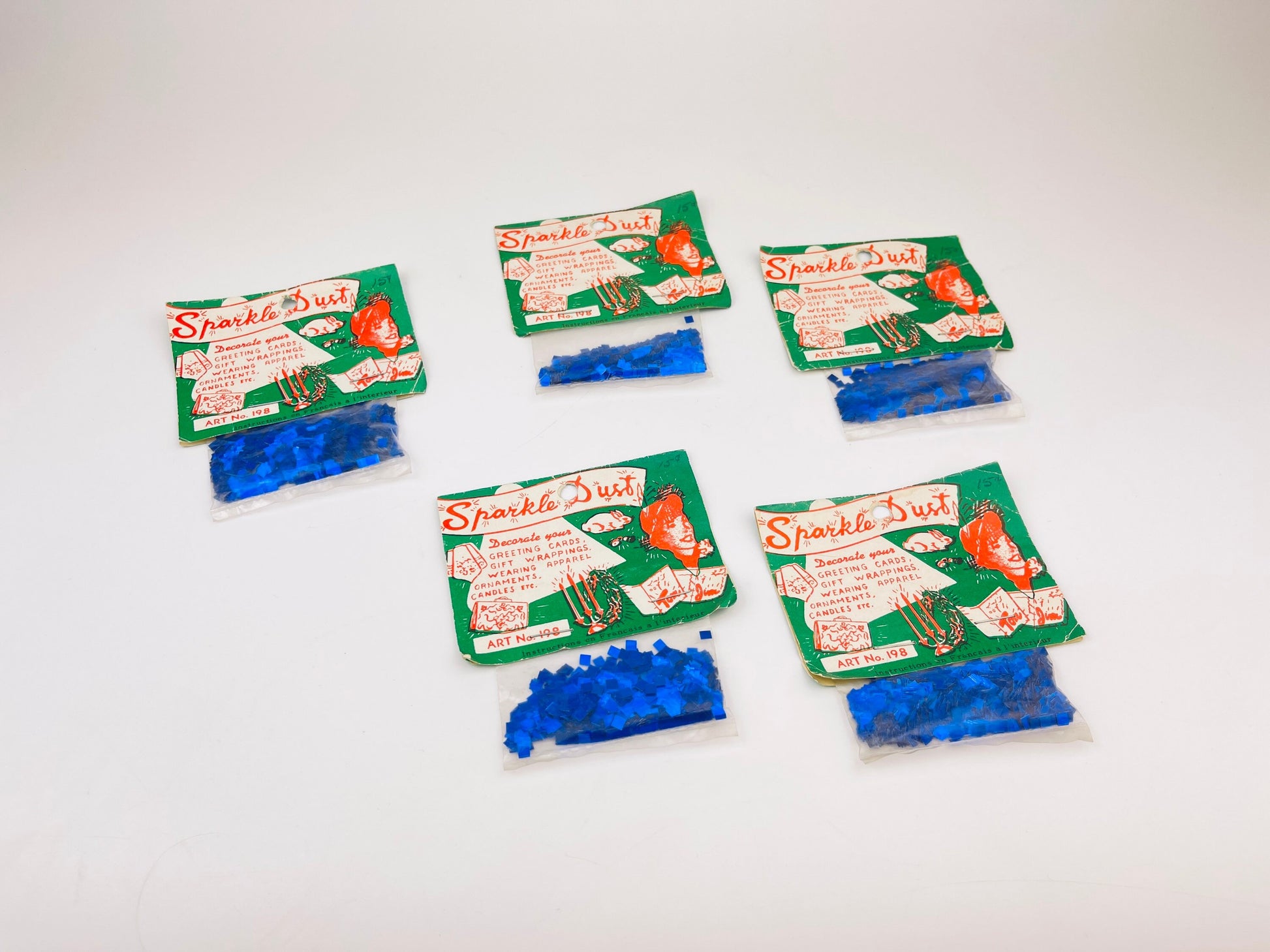 Product image for 'vintage holiday blue sparkle dust confetti glitter gift embellishment new old stock nos hanukkah christmas gift wrap glitter' (view 303a5b)