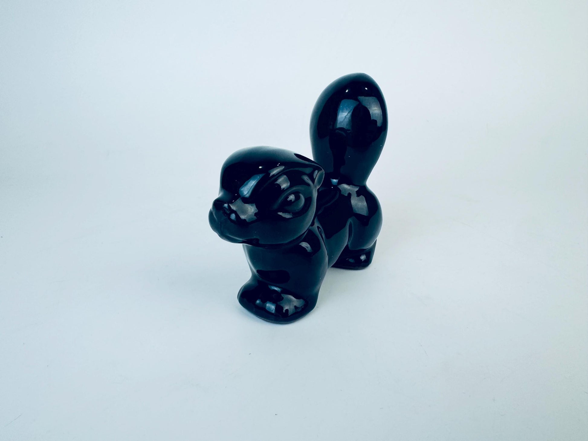 Product image for 'vintage kitsch black skunk red clay figurine made in japan' (view ad4b1e)