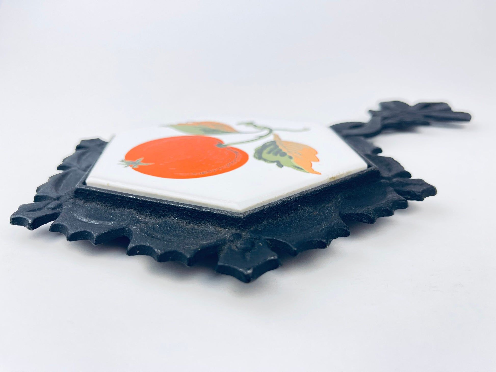 Product image for 'vintage cast iron ceramic apple design trivet hot pot plate holder made in japan by lego wedding bells gift' (view 00db6a)