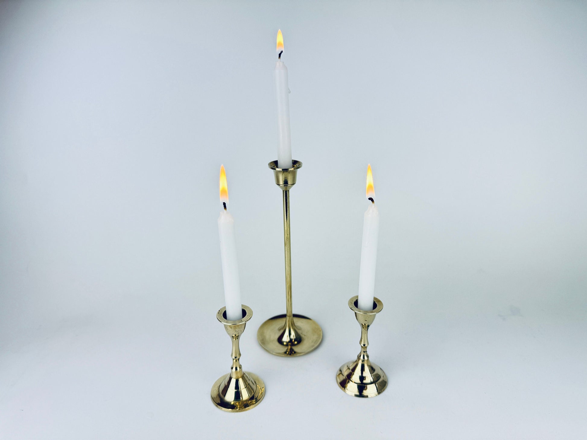 Product image for 'vintage tabletop brass small mini spell prayer candle stick holders mixed lot of three 3 attractive aged metal patina' (view e79065)