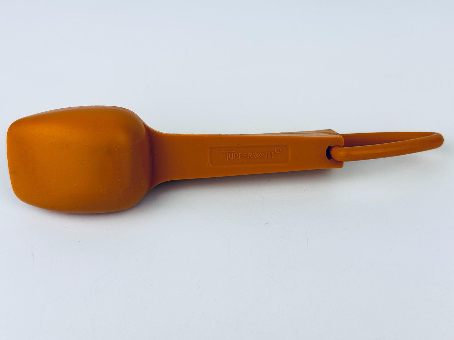 Product image for 'vintage 1980s tupperware orange plastic stacking measuring spoons classic retro kitchenware' (view cdfc72)