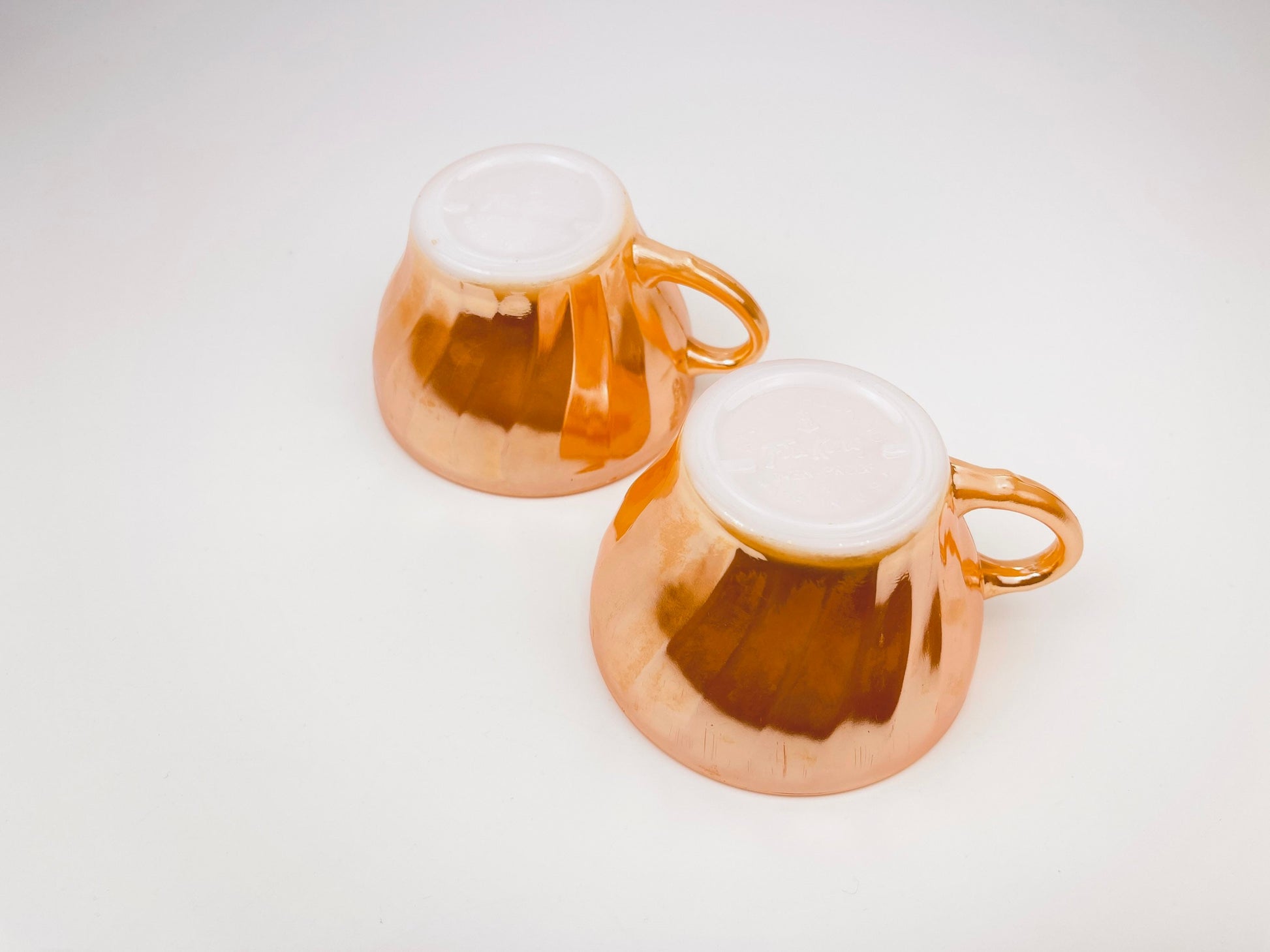 Product image for 'vintage peach lustreware swirl tea cups set of two 2 anchor hocking fire king made in usa' (view bc9806)