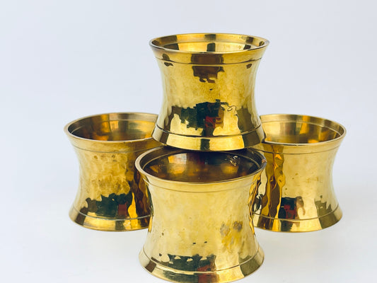 Product image for 'vintage hammered brass hourglass shaped napkin ring holders set of four 4 attractive aged metal patina' (view e64ffe)