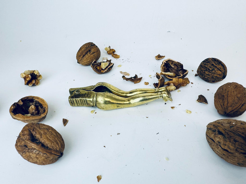 Product image for 'mid century brass leg nutcracker 1960s vintage brass kitchen gadget sculptural hand held nut cracker' (view ea3225)