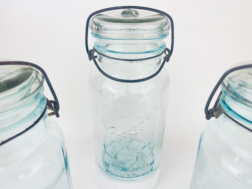 Product image for 'antique safety seal wide mouth aqua blue glass jar 2 pint capacity lightning metal hinge clasp made in canada sold separately' (view 5eeb56)