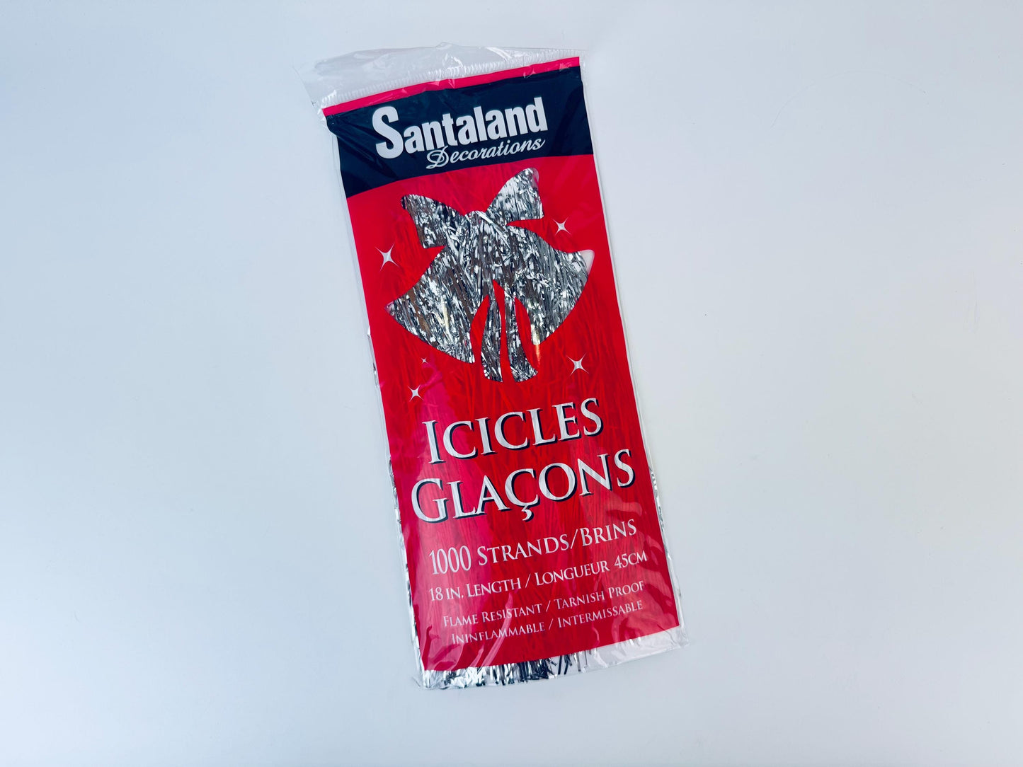 Product image for 'vintage flameproof silver christmas tree icicles tinsel strands new old stock nos packages sold separately' (view 39c330)