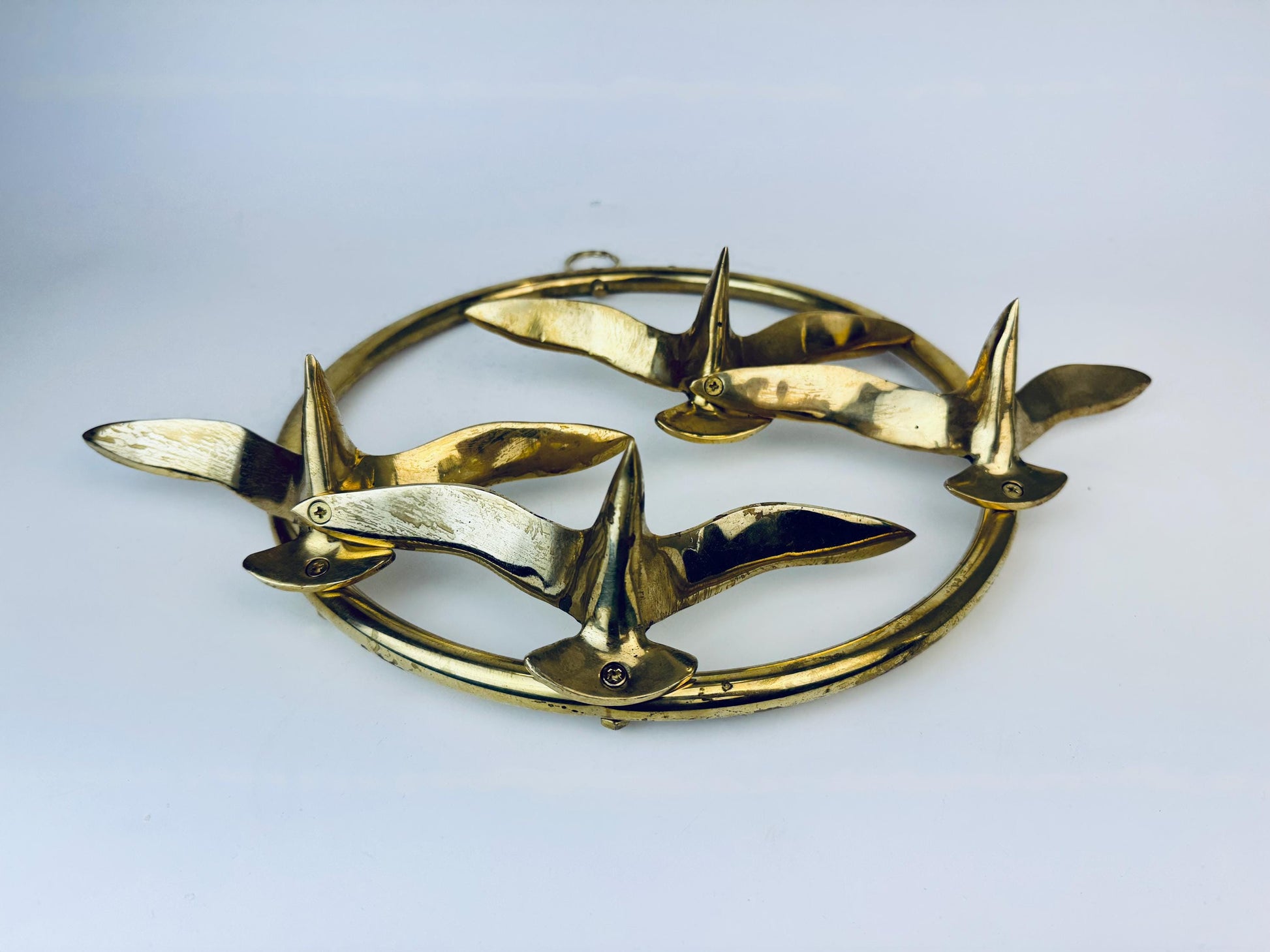 Product image for 'vintage wall mounted flying solid brass bird quattro 11 circular ring' (view 540fc6)