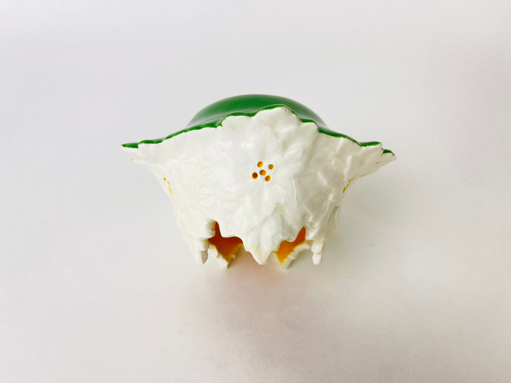 Product image for 'vintage tea light ceramic candle holder white flower green bottom' (view e73bc7)