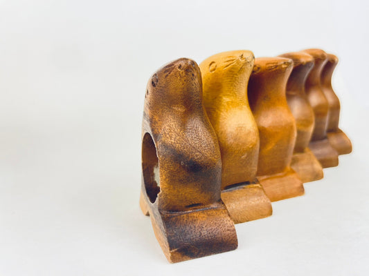 Product image for 'vintage hand carved wooden sea lion napkin ring holders set of five 5' (view e25541)