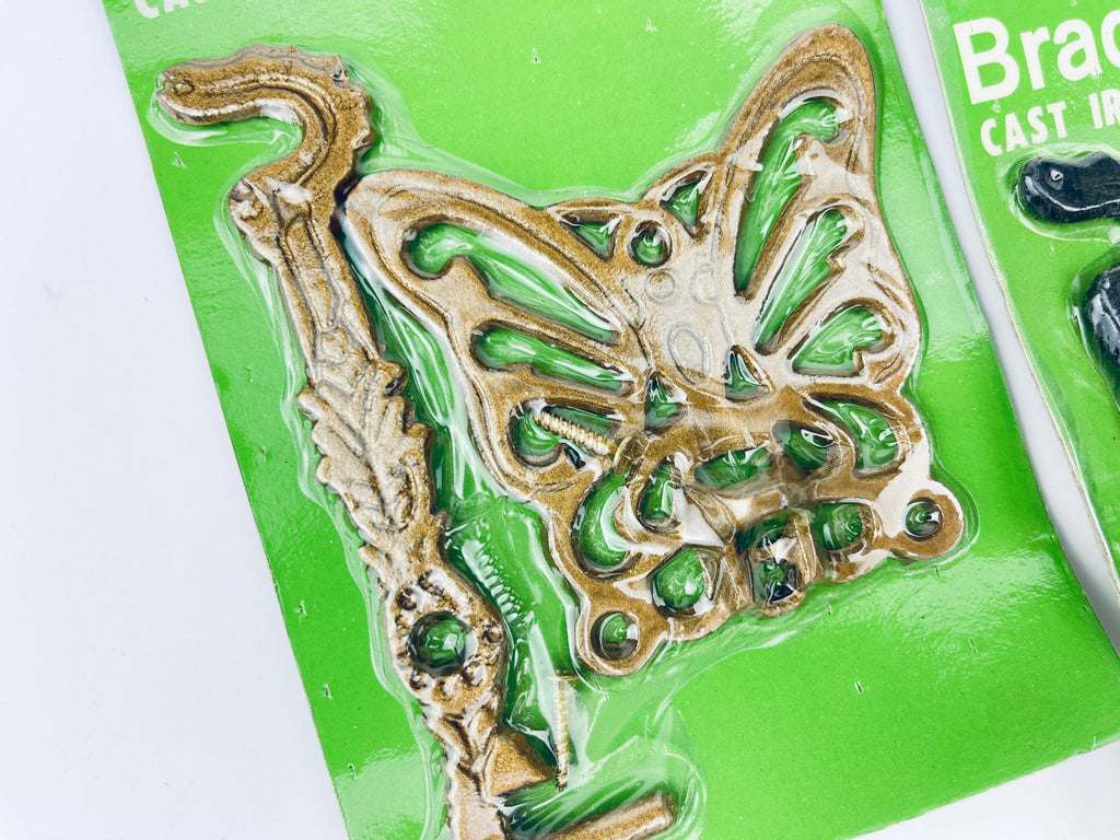 Product image for 'vintage cast iron butterfly swivel wall hanger bracket new old stock nos gold black colour options' (view a5cc5a)