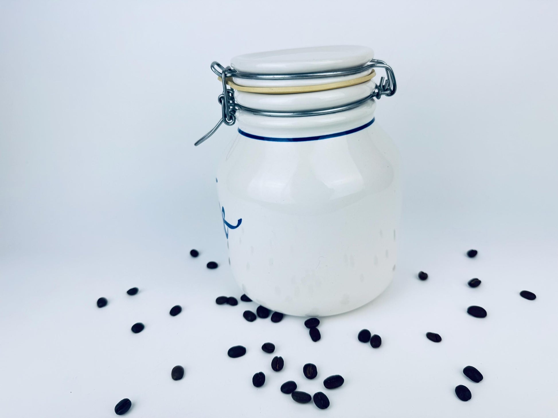 Product image for 'vintage 1990s beige blue ceramic coffee canister airtight countertop jar' (view 03e90a)