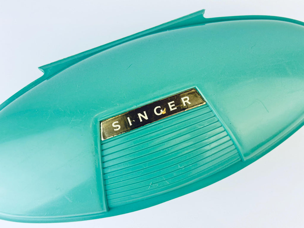 Product image for 'vintage singer slant shank buttonhole attachment 489510 patent 2482607 made in usa atomic jetsons aqua green case' (view c241cd)
