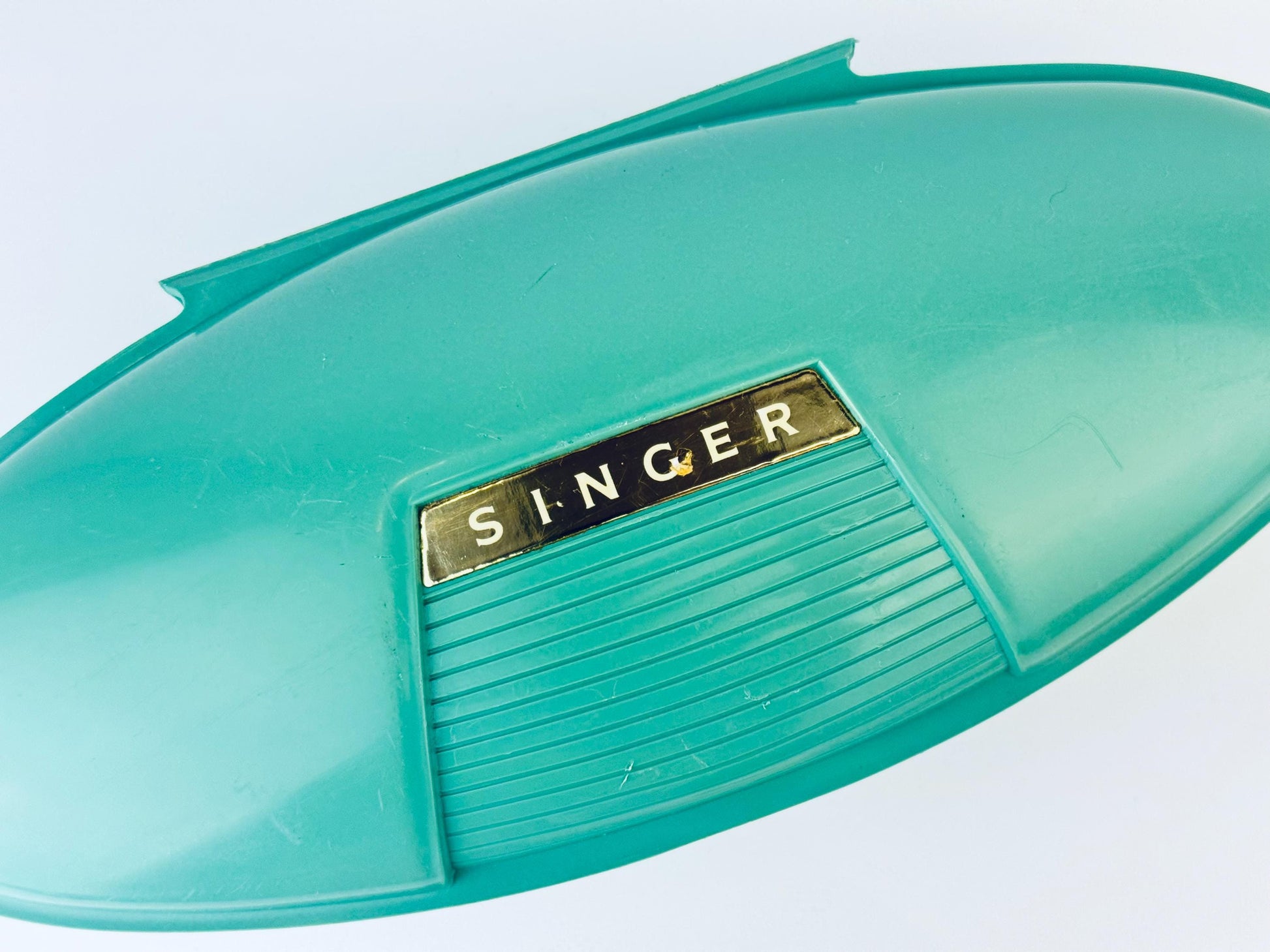 Product image for 'vintage singer slant shank buttonhole attachment 489510 patent 2482607 made in usa atomic jetsons aqua green case' (view c241cd)