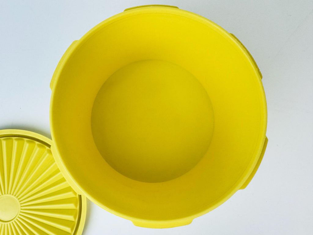 Product image for 'vintage yellow plastic tupperware servalier countertop container instant touch lid scroll pattern made in canada' (view db218e)