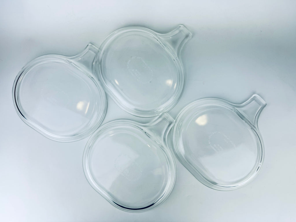 Product image for 'vintage pyrex clear glass grab it microwave oven plates set of two 2 600 b 15 cm x 20 cm made in usa sets sold separately' (view 3f7551)