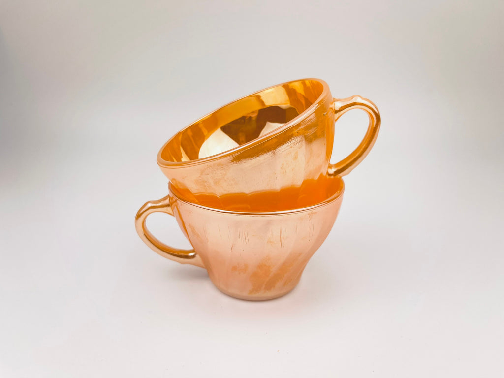 Product image for 'vintage peach lustreware swirl tea cups set of two 2 anchor hocking fire king made in usa' (view b67baf)