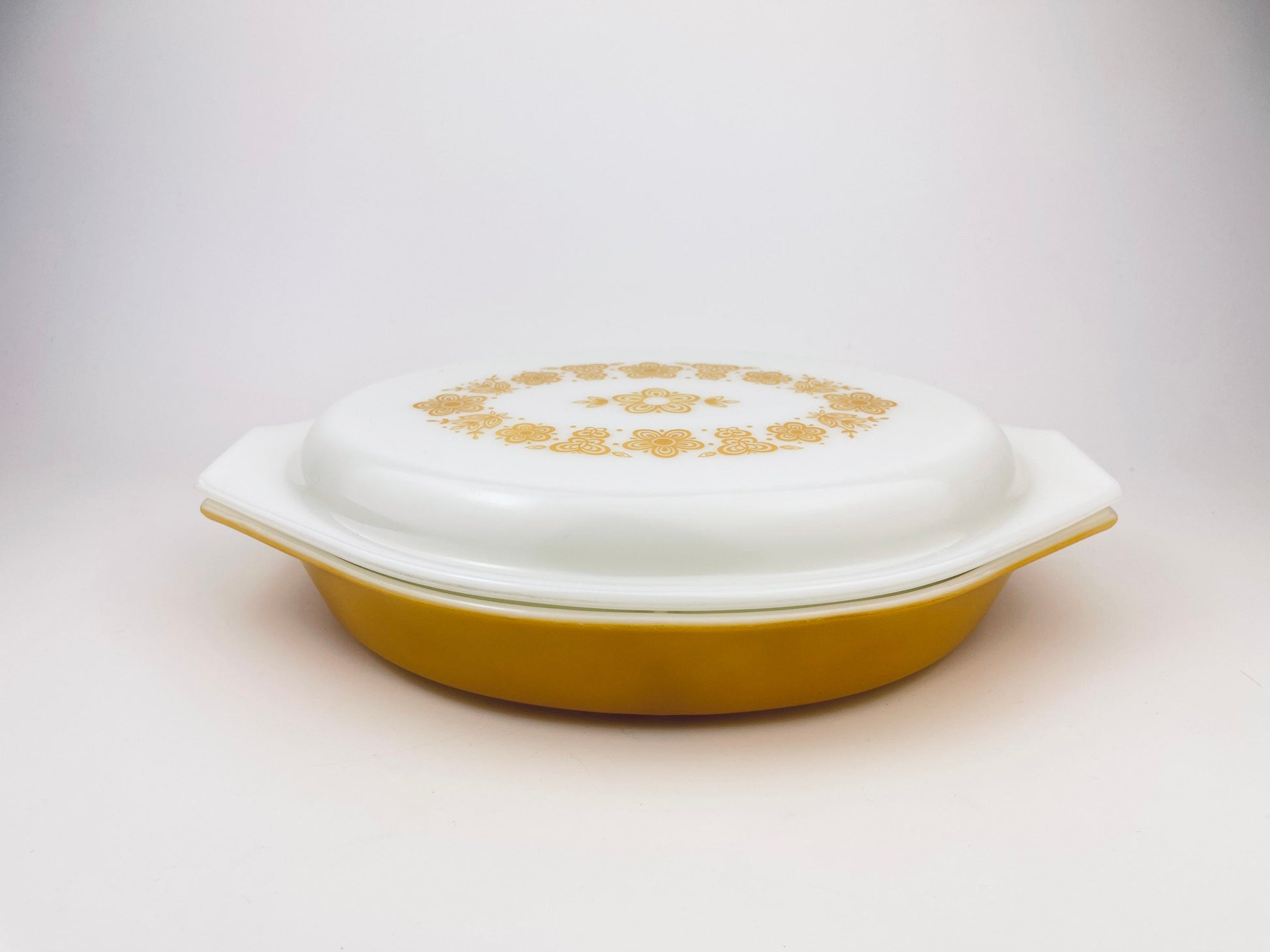 Product image for 'vintage butterfly gold pyrex divided casserole dish 1 qt' (view dee1dd)